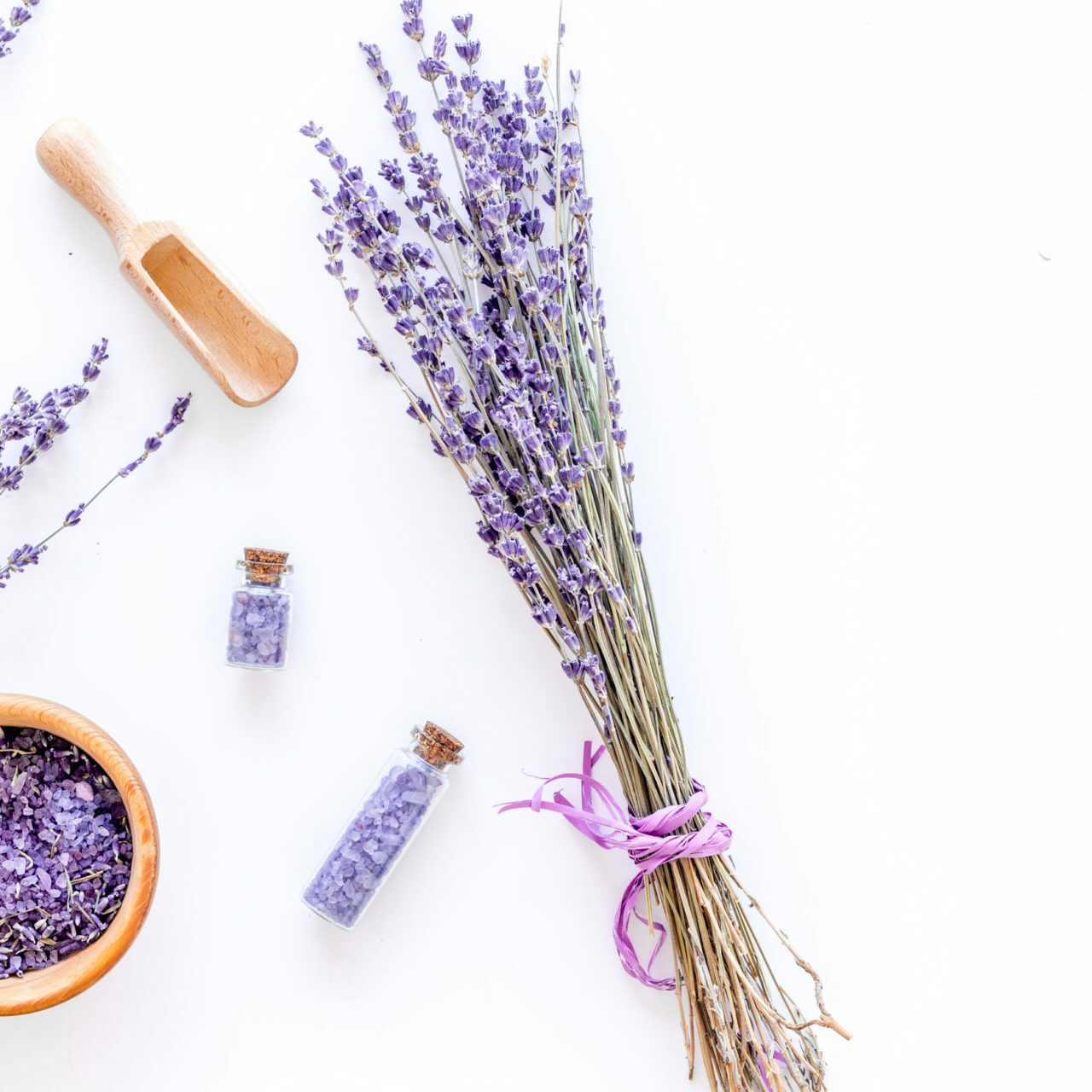 organic cosmetic set with lavender herbs and sea salt in bottle on white table background flat lay mockup